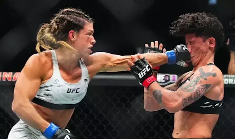 Жесткая заруба решила судьбу титульного поединка UFC